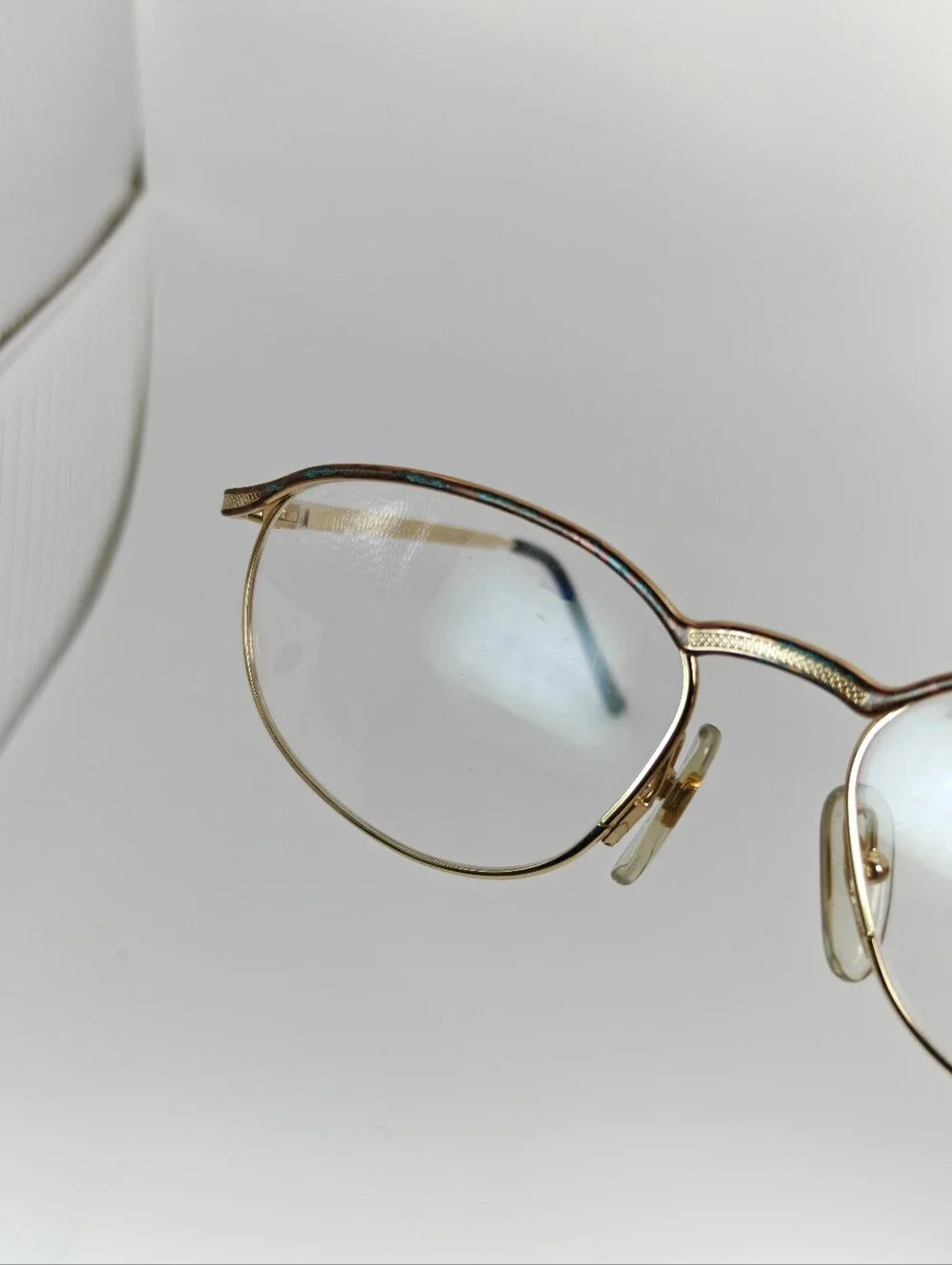 Manola Odo Frames Round Gold-Tone. Glasses with Subtle Copper Weathered Patina.